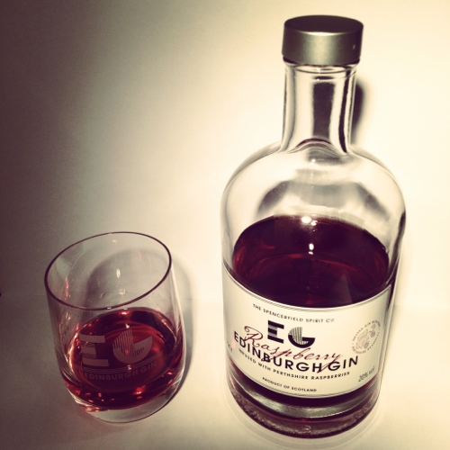 Edinburgh Raspberry Gin, in a bottle and a glass.